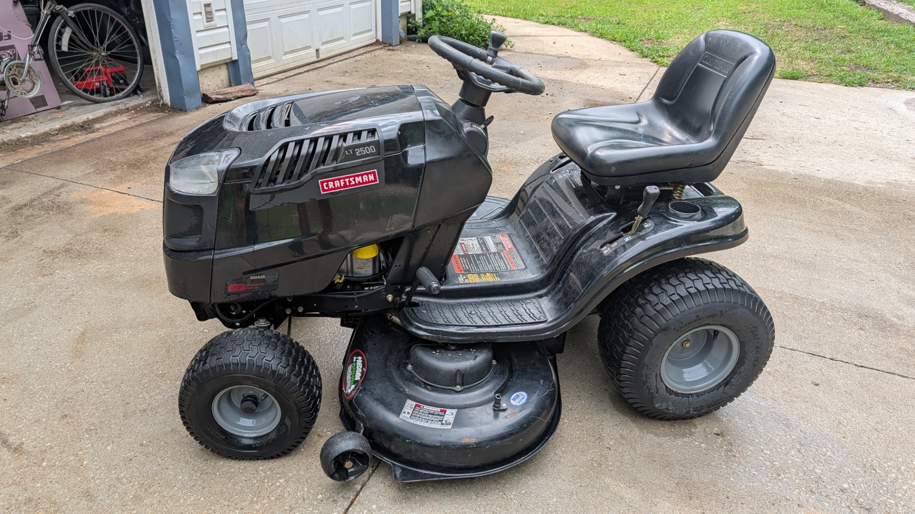 Craftsman LT 2500 riding mower with 42 inch deck, side view