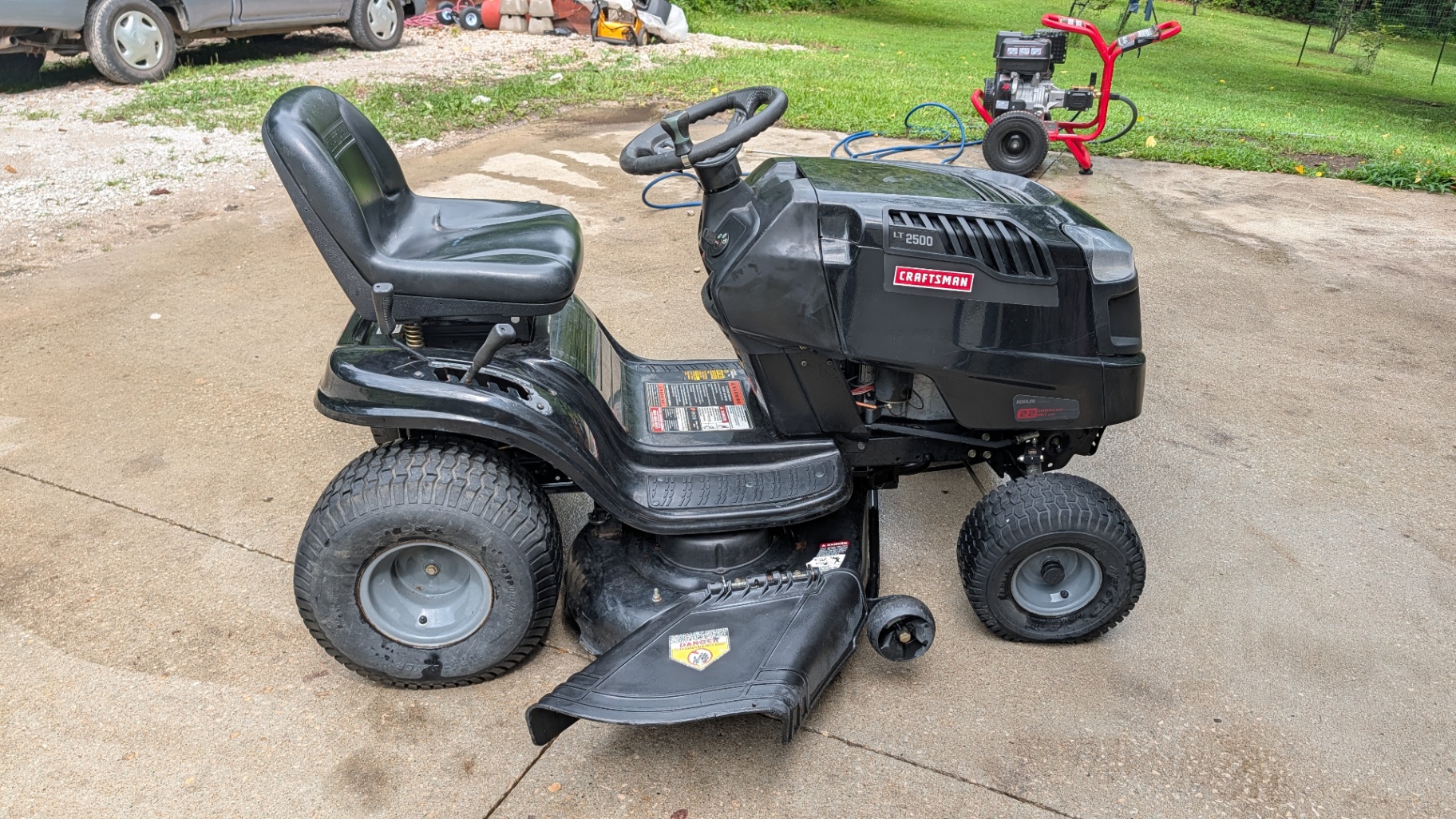 Craftsman LT 2500 riding mower on the driveway