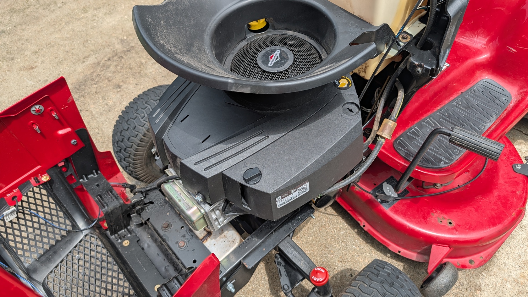 Craftsman T2300 riding mower engine with hood panels removed